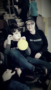 Stephanie and Bryce wearing, "Got Autism" shirts, that are the foundation t-shirts. This was also their  first sporting event together. "I have waited for fourteen-years to be able to take him to something like this." 
